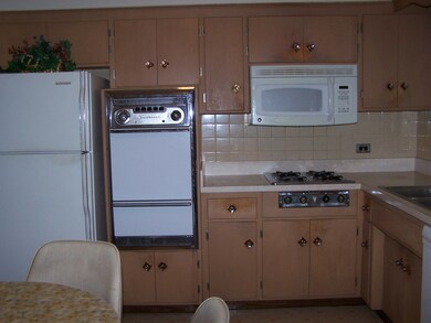 Kitchen with loads of cabinets