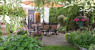 back left yard to patio zoom 2