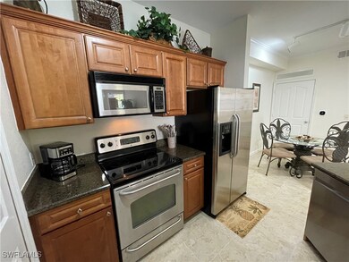 12935 Violino Ln unit 205, Naples, FL 34105 - photo 3