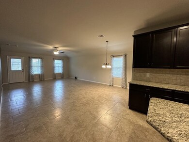 An open Co an open concept layout with a spacious kitchen. 
