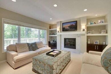 Gas fireplace, new carpet, recessed lighting.  Ent