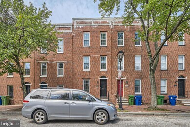 1057 W Barre St, Baltimore, MD 21230 - photo 2