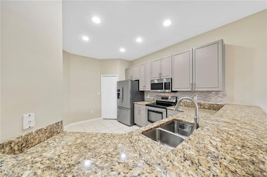 15662 Summit Place Cir unit 385, Naples, FL 34119 - photo 7
