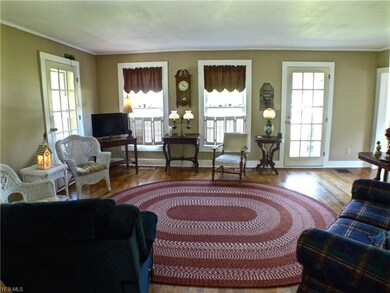 looking into living room with hardwood floors from