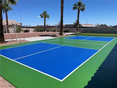 View of tennis court featuring community basketbal