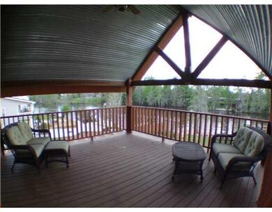 Exterior Front. Master porch