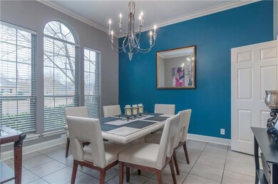 The dining room off the entry is enhanced by large