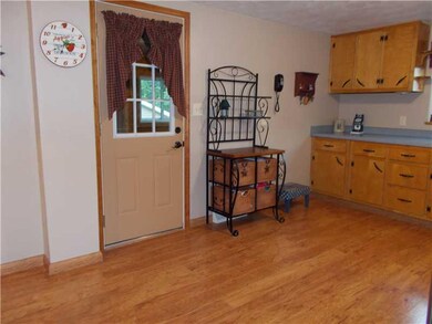 Kitchen. Opens to 3 season room