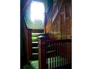 Entry/Foyer. Double set of stairs (from Entry and 