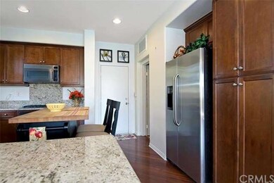 The kitchen is adjacent to the over sized 2 car at