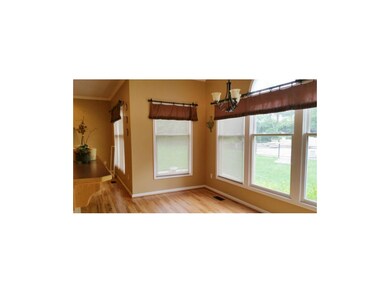 Kitchen Dining Area Overlooks the Pool
