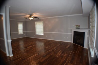 Another angled view of living/family room with cor