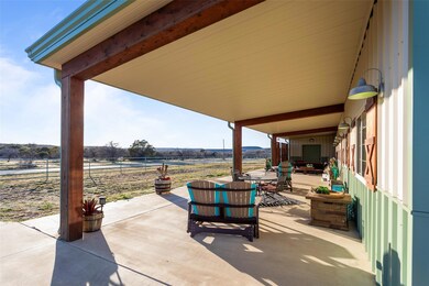 View of patio / terrace featuring fence