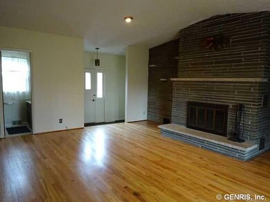 Foyer Entry into a small foyer with one step to th