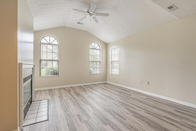 8595-stonewoods-lane-bright-living-room