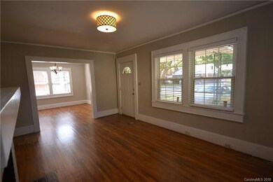 Living room includes front entrance and is adjacen