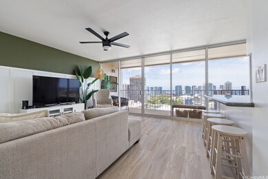 The kitchen bar top is on the right & living room