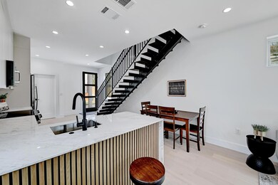 Kitchen with a peninsula, recessed lighting, ligh