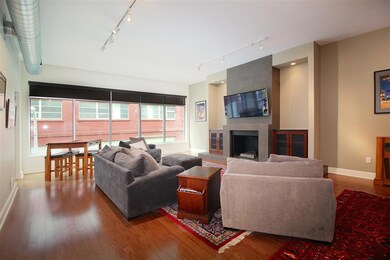 The gas fireplace is the focal point of the living