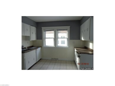 Updated cabinets in kitchen with ceramic tile flooring. Built in dishwasher