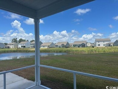 View of yard with a water view