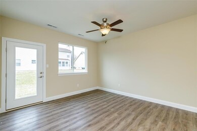 This photo is a representation of a similar home in the neighborhood.  Some features shown may be optional upgrades.  The colors represent those that are in the listed home.