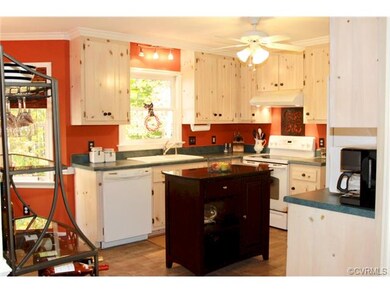 View of the Kitchen off of the Dining Room and the