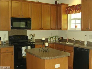 Kitchen. Bright Sunny Kitchen with Island, Pantry & Built In Microwave