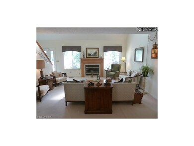 Living Room w/Gas Fireplace & Skylights