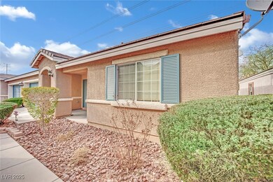 View of side of home with stucco siding