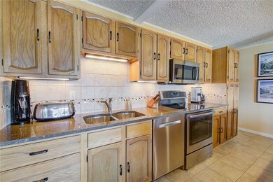 Newly tiled backsplash, Bosch dishwasher, and indu