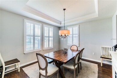 The Formal Dining Room features tray ceilings, cro