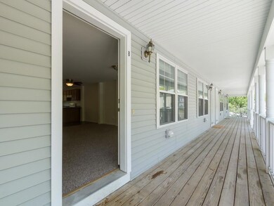 Porch with roof overhead to help...