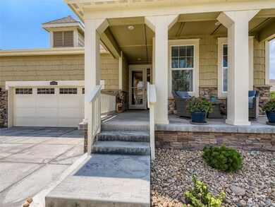 Relaxing front porch with wide walkway.