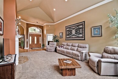 Main floor living area with tons of recessed lighting. Kitchen, dining and three bedrooms on main floor.