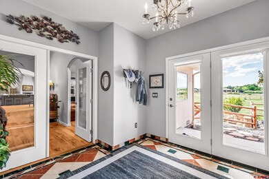 Spacious entry with marble tiled flooring.  So inviting!