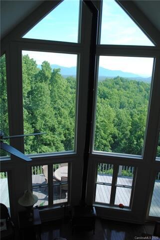 The two stories of windows in the great room make 