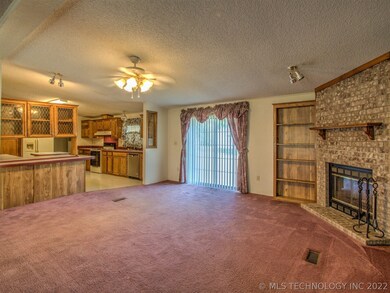 Completely open to the kitchen, this living area w