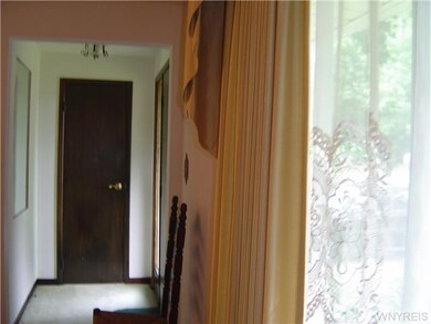 Foyer Front entry leads to foyer with ample coat c