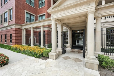 Entrance to property with brick siding