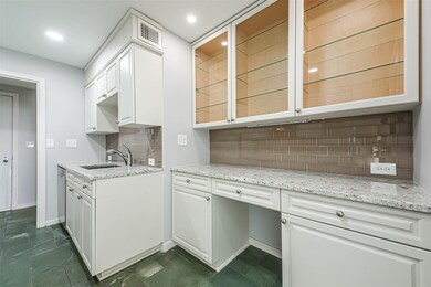 The glass front cabinets are the perfect place to