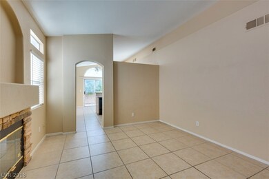 Enter into formal Living Room with fireplace, mant