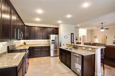 Large kitchen with 3cm granite and stainless steel