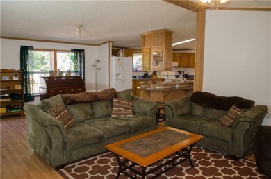 Living room is open to kitchen