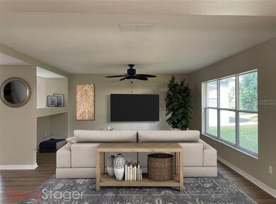 Downstairs family room, virtually staged