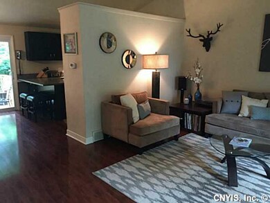 Living Room Open floor plan leads you to the kitch