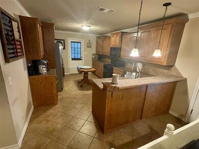 500 E Greenfield Dr, Wake Village, TX 75501 - photo 2