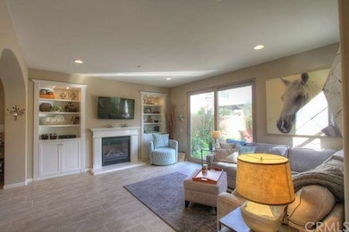 Two custom built-in Bookshelves with Cozy fireplac