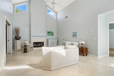 Spacious living room with vaulted ceilings.
