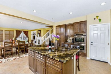 Renovated and highly functional kitchen has a larg
